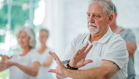 Elderly people exercising