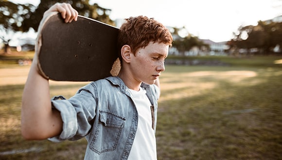 young boy and skateboard