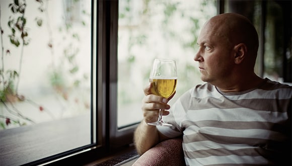 Man with a glass of wine