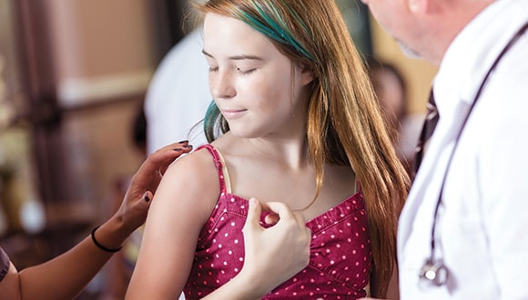 Girl getting the HPV vaccine 