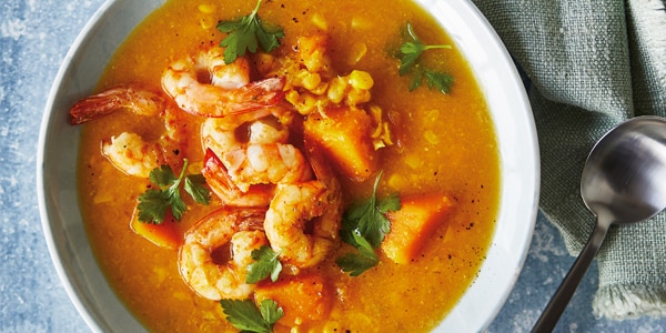 Bowl of prawn, pumpkin and corn chowder