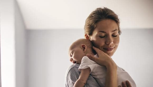 Mother holding her newborn baby