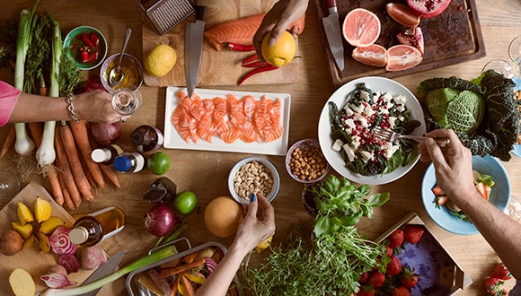 Table laden with healthy dishes for healthy ageing