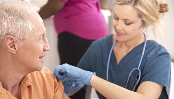 A person getting the flu shot